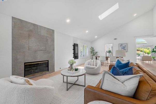 Dining room, Fireplace, Interior, Living room, Recessed Lighting, Wood Texture Flooring