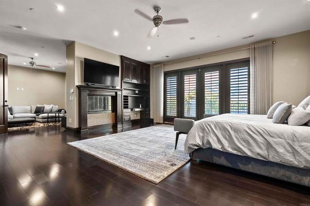Bedroom, Fireplace, Interior, Recessed Lighting, Wood Texture Flooring