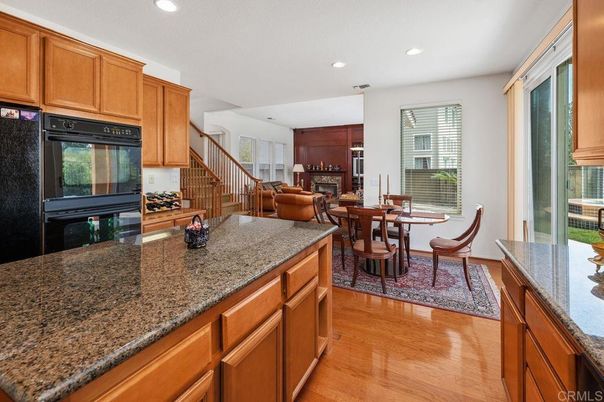 Dining room, Fireplace, Interior, Kitchen, Living room, Recessed Lighting, Wood Texture Flooring