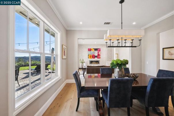 Dining room, Fireplace, Interior, Pendant Lights, Recessed Lighting, Wood Texture Flooring