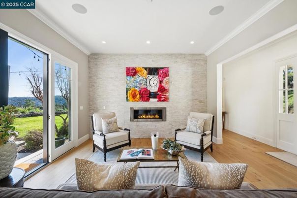 Fireplace, Interior, Living room, Recessed Lighting, Stone Walls, Wood Texture Flooring