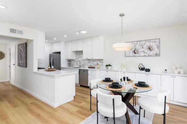 Dining room, Interior, Kitchen, Pendant Lights, Recessed Lighting, Stainless Steel Appliances, Wood Texture Flooring