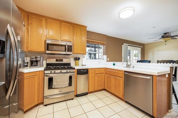 Interior, Kitchen, Stainless Steel Appliances, Tile Countertops
