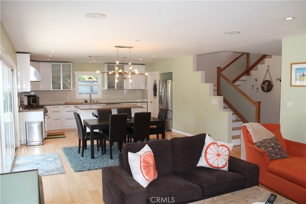 Dining room, Interior, Kitchen, Living room, Pendant Lights, Recessed Lighting, Stainless Steel Appliances, Wood Texture Flooring