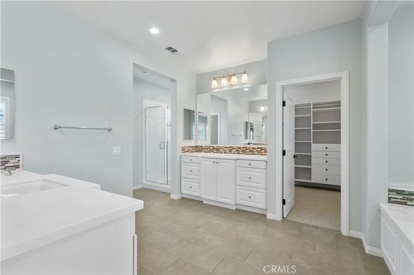 Bathroom, Dual Sink Vanities, Interior, Recessed Lighting, Walk-in Closets