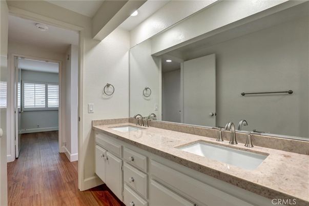 Bathroom, Dual Sink Vanities, Interior, Recessed Lighting, Wood Texture Flooring