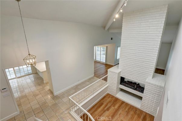 Empty room, Fireplace, Interior, Pendant Lights, Wood Texture Flooring
