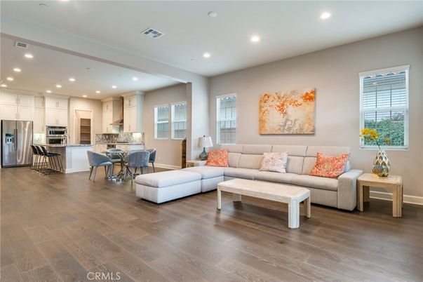 Dining room, Interior, Kitchen, Living room, Recessed Lighting, Stainless Steel Appliances, Wood Texture Flooring