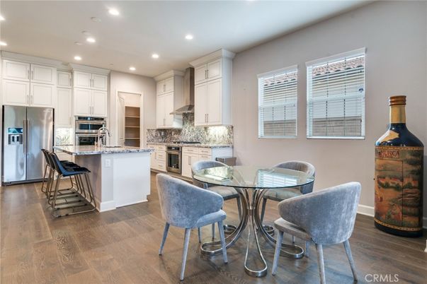 Dining room, Interior, Kitchen, Recessed Lighting, Stainless Steel Appliances, Wood Texture Flooring
