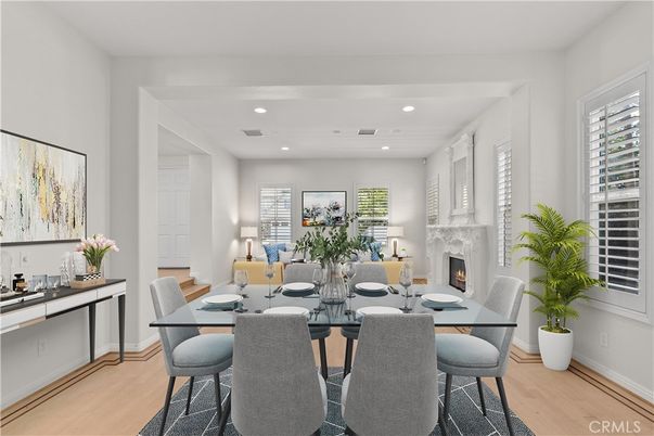 Dining room, Fireplace, Interior, Living room, Recessed Lighting, Wood Texture Flooring