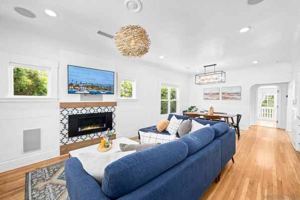 Dining room, Fireplace, Interior, Living room, Pendant Lights, Recessed Lighting, Wood Texture Flooring
