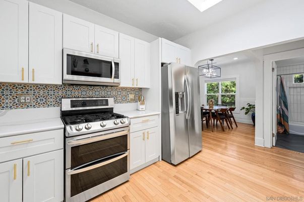 Dining room, Interior, Kitchen, Recessed Lighting, Stainless Steel Appliances, Wood Texture Flooring