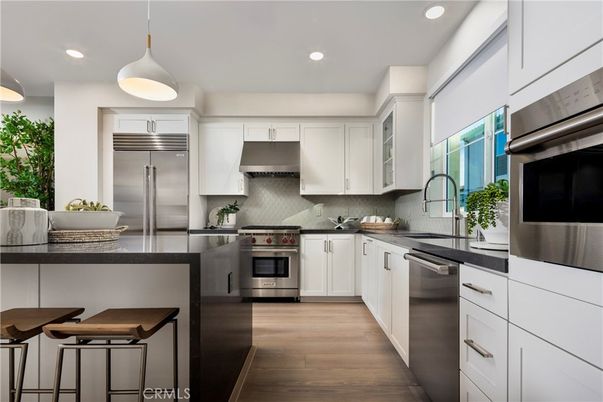 Interior, Kitchen, Pendant Lights, Recessed Lighting, Stainless Steel Appliances, Wood Texture Flooring