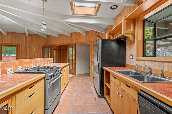Interior, Kitchen, Pendant Lights, Tile Countertops, Wooden Walls