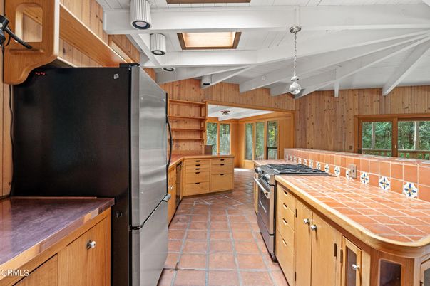 Interior, Kitchen, Stainless Steel Appliances, Tile Countertops, Wooden Walls