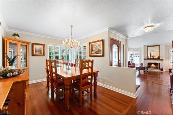 Chandelier, Dining room, Fireplace, Interior, Living room, Wood Texture Flooring