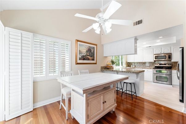 Dining room, Interior, Kitchen, Recessed Lighting, Stainless Steel Appliances, Wood Texture Flooring
