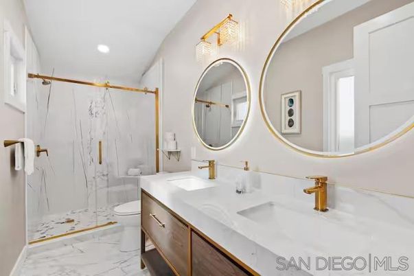 Bathroom, Dual Sink Vanities, Glass Shower, Interior, Marble, Marble Walls, Recessed Lighting