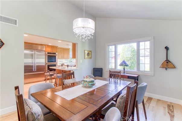 Chandelier, Dining room, Interior, Kitchen, Recessed Lighting, Stainless Steel Appliances, Wood Texture Flooring