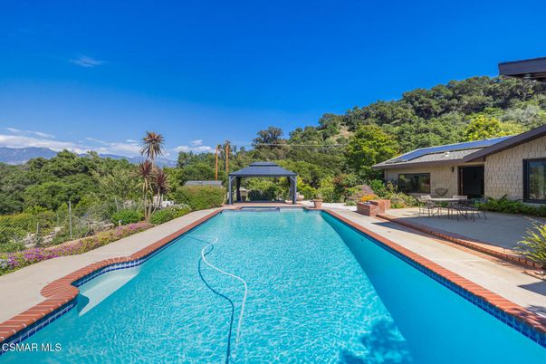 Exterior, Pool, Solar Panels