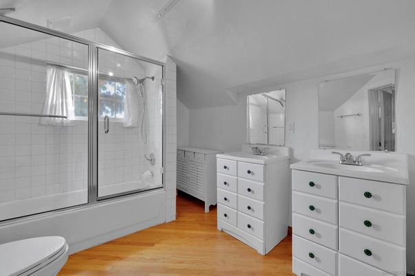 Bathroom, Dual Sink Vanities, Glass Shower, Interior, Wood Texture Flooring
