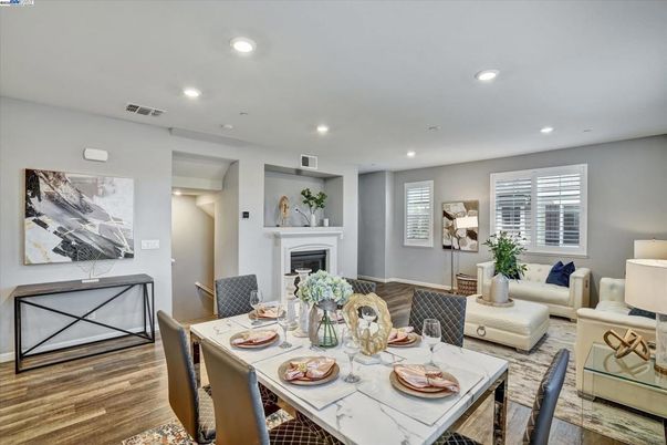 Dining room, Fireplace, Interior, Living room, Recessed Lighting, Wood Texture Flooring