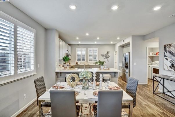Dining room, Interior, Kitchen, Recessed Lighting, Stainless Steel Appliances, Wood Texture Flooring