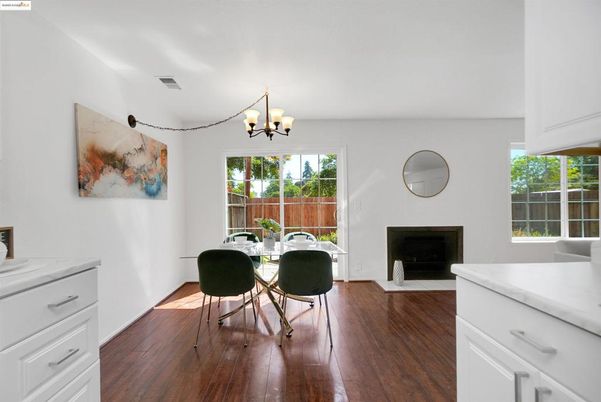 Chandelier, Dining room, Fireplace, Interior, Wood Texture Flooring