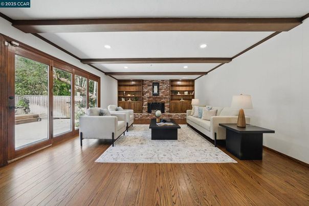 Fireplace, Interior, Living room, Recessed Lighting, Stone Walls, Wooden Beams, Wood Texture Flooring