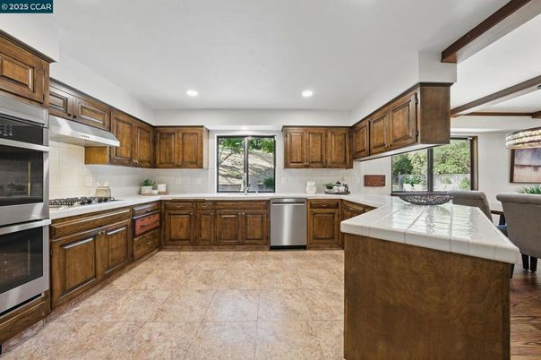 Interior, Kitchen, Recessed Lighting, Stainless Steel Appliances, Tile Countertops