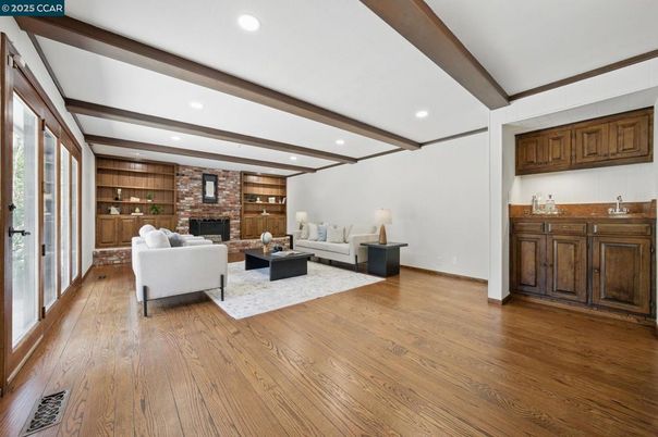 Fireplace, Interior, Living room, Recessed Lighting, Stone Walls, Wooden Beams, Wood Texture Flooring