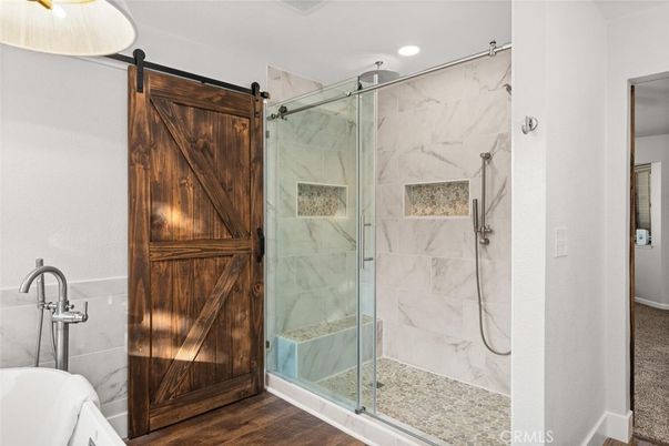 Bathroom, Glass Shower, Interior, Marble Walls, Recessed Lighting, Wood Texture Flooring