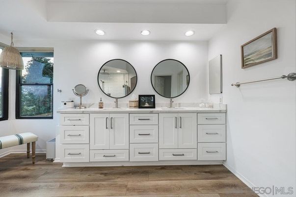 Bathroom, Dual Sink Vanities, Interior, Pendant Lights, Recessed Lighting, Wood Texture Flooring