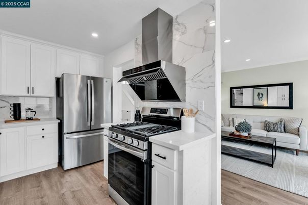 Interior, Kitchen, Living room, Marble Walls, Recessed Lighting, Stainless Steel Appliances, Wood Texture Flooring