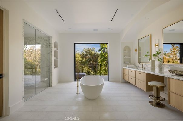 Bathroom, Dual Sink Vanities, Free Standing Baths, Glass Shower, Interior, Marble Walls, Recessed Lighting