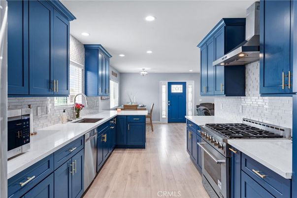 Dining room, Interior, Kitchen, Recessed Lighting, Stainless Steel Appliances, Wood Texture Flooring