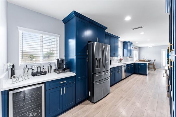 Dining room, Interior, Kitchen, Recessed Lighting, Stainless Steel Appliances, Wood Texture Flooring