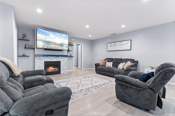 Fireplace, Interior, Living room, Recessed Lighting, Wood Texture Flooring