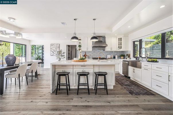 Dining room, Interior, Kitchen, Pendant Lights, Recessed Lighting, Stainless Steel Appliances, Wood Texture Flooring