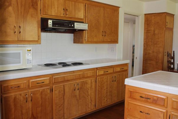 Interior, Kitchen, Tile Countertops, Wood Texture Flooring