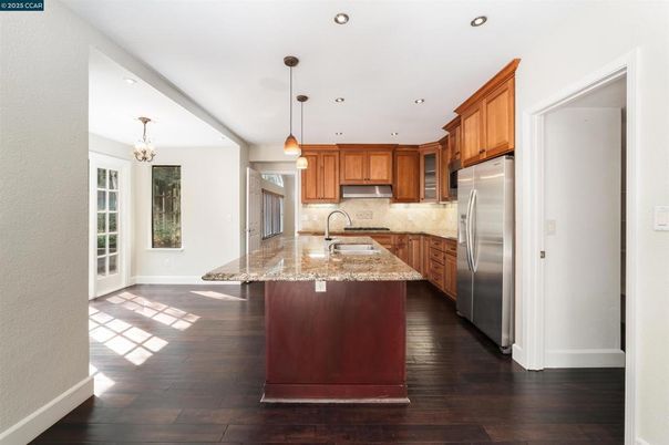 Chandelier, Interior, Kitchen, Pendant Lights, Recessed Lighting, Stainless Steel Appliances, Wood Texture Flooring