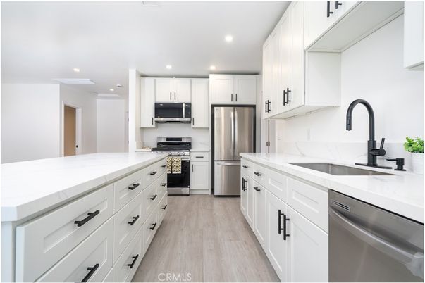 Interior, Kitchen, Recessed Lighting, Stainless Steel Appliances, Wood Texture Flooring