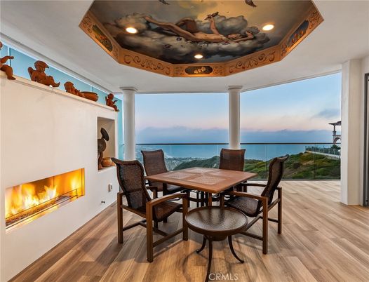 Dining room, Fireplace, Interior, Recessed Lighting, Water, Wood Texture Flooring
