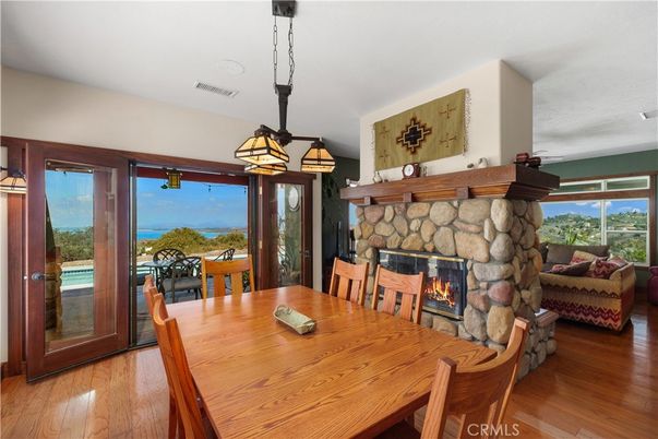 Dining room, Fireplace, Interior, Pendant Lights, Wood Texture Flooring