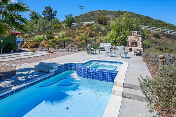 Exterior, Fireplace, Pool