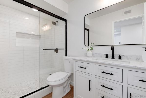 Bathroom, Dual Sink Vanities, Glass Shower, Interior, Wood Texture Flooring