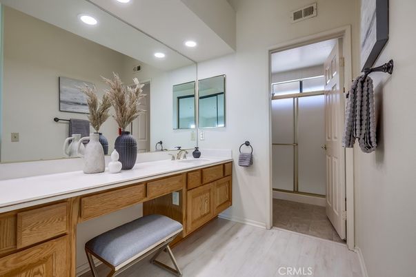 Bathroom, Dual Sink Vanities, Interior, Recessed Lighting, Wood Texture Flooring