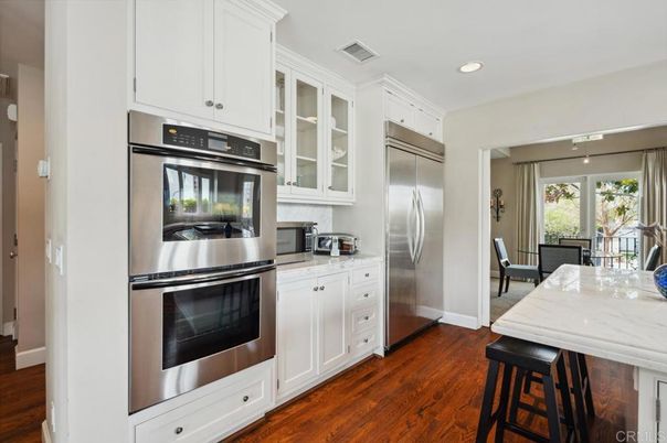 Dining room, Interior, Kitchen, Recessed Lighting, Stainless Steel Appliances, Wood Texture Flooring