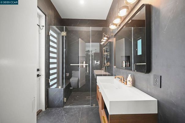 Bathroom, Dual Sink Vanities, Glass Shower, Interior, Marble, Marble Walls, Recessed Lighting