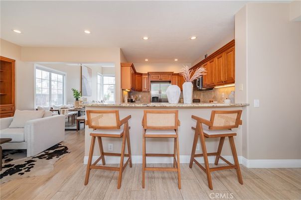 Dining room, Interior, Kitchen, Living room, Recessed Lighting, Stainless Steel Appliances, Wood Texture Flooring